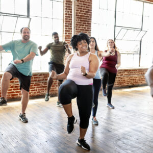 Diverse people in an active dance class